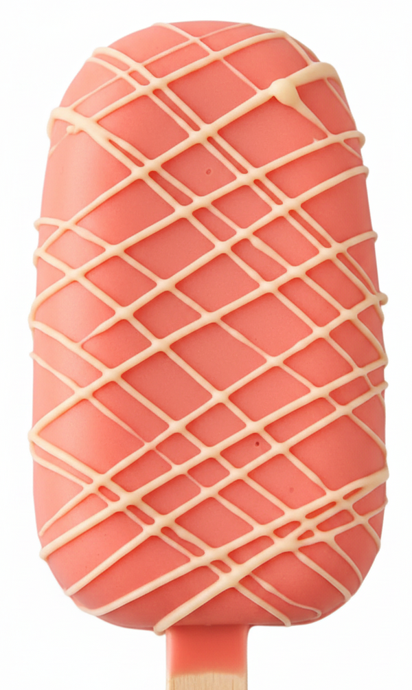 A strawberry cake pop  with white drizzle on top, on a wooden stick against a plain white background.